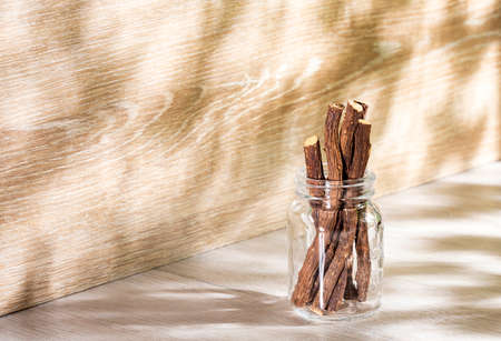Glycyrrhiza glabra - Licorice stems in the glass jarの写真素材