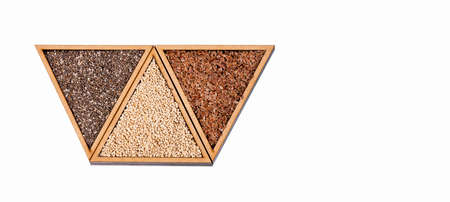 Quinoa, flaxseed and chia - Organic seeds. Triangular bowlの写真素材