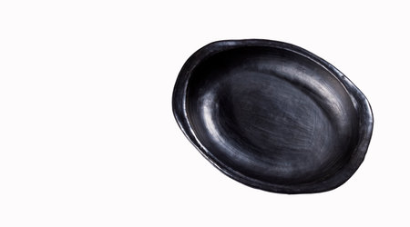 Black clay tray plate, Colombian kitchen productの写真素材