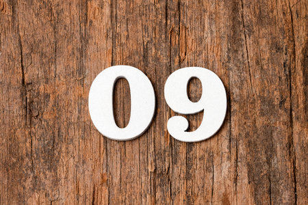 zero nine - Wooden numbers on rustic backgroundの写真素材