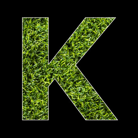 Uppercase letter K - Artificial grass background textureの写真素材