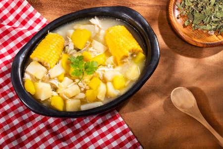 Tasty soup ajiaco with chicken and vegetables. Colombian cuisineの写真素材