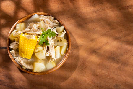 Tasty soup ajiaco with chicken and vegetables. Colombian cuisineの写真素材