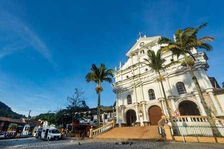 Angostura, Antioquia. Colombia - September 26, 2021. Parish of Our Lady of the Rosary of ChiquinquirÃ¡ and for several years sanctuary of Blessed Father Marianitoのeditorial素材
