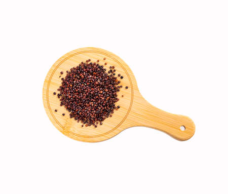 Chenopodium quinoa - Black organic quinoa seeds on the wooden boardの写真素材