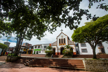 San Luis, Antioquia. Colombia - October 13, 2021. Iglesia de San Luis Gonzaga, is a Colombian temple of Catholic worshipのeditorial素材