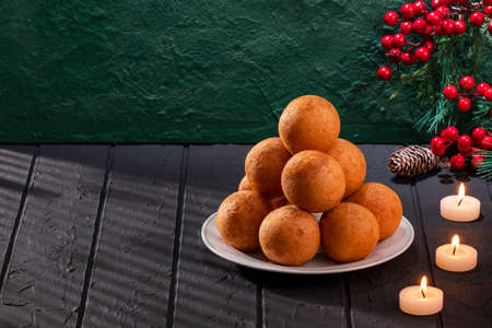 Traditional Colombian buÃ±uelo - Christmas atmosphere. candlesの写真素材