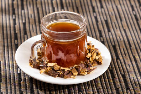 Tea and stems of licorice - Glycyrrhiza glabra.