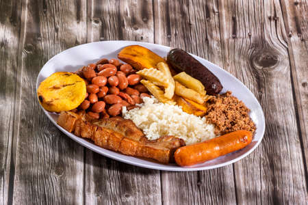 Bandeja paisa most representative dish of Colombia and the insignia of Antioquia gastronomyの写真素材