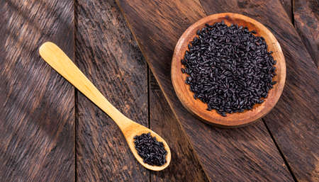 Raw black vegan rice in bowl - Healthy foodの写真素材