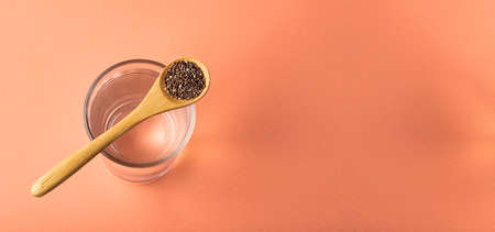 Spoon with chia seeds to mix with water - Salvia hispÃ¡nicaの写真素材
