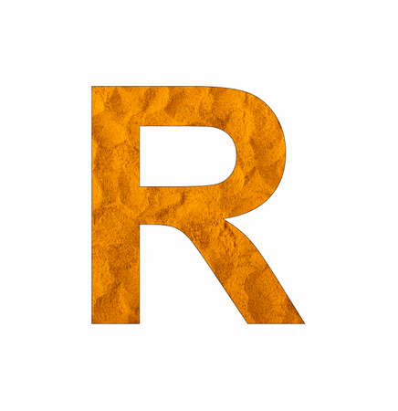 Letter R on turmeric background - Uppercase alphabetの写真素材