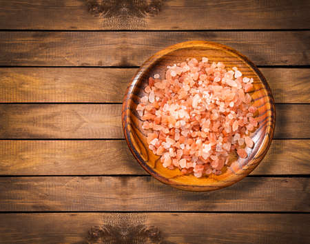 Himalayan pink salt crystals, powdered red rock salt from Pakistanの写真素材