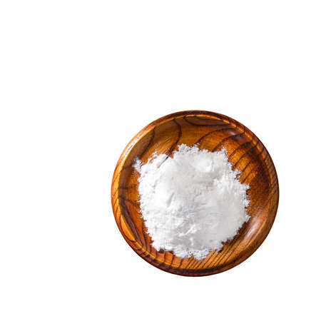 Baking soda in the wooden bowl - Healthy foodの写真素材