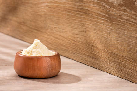 Powdered or dehydrated milk in the bowlの写真素材