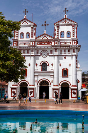 Guatape, Antioquia / Colombia - May 25, 2022. Church of Our Lady of Carmen, In 1930 it was endowed with benches, bells, Frenchのeditorial素材