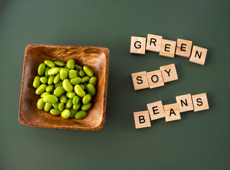 Organic fresh soybeans in the wooden bowl - Glycine maxの写真素材