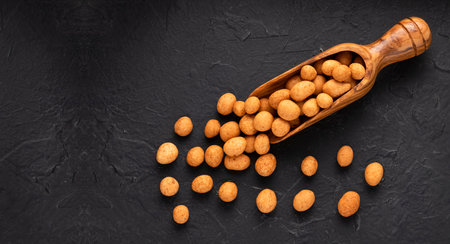 Organic Mexican peanuts in the spoon - Arachis hypogaeaの写真素材