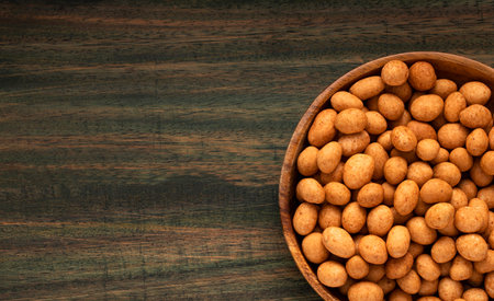 Organic mexican peanuts in the bowl - Arachis hypogaeaの写真素材