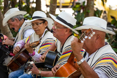 Medellin, Antioquia. Colombia - January 26, 2023. Antioquian street artists performing traditional Colombian musicのeditorial素材
