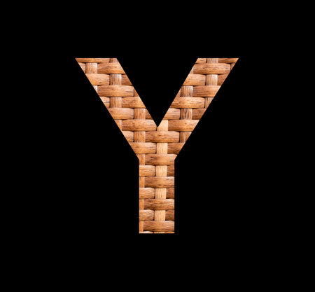 Alphabet letter Y - Symmetrically intertwined natural rattan backgroundの写真素材