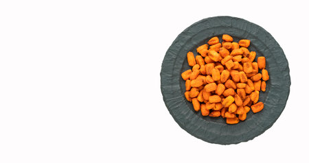 Crunchy salty chili corn - Zea mays. Toasted snacks in the bowl