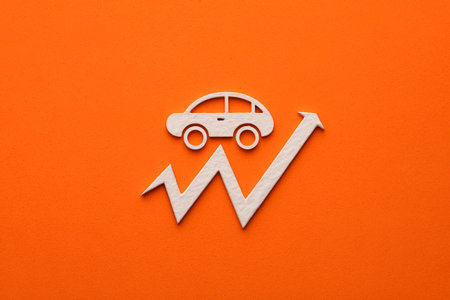 White car with upward arrow on orange background - Concept of rising car pricesの写真素材