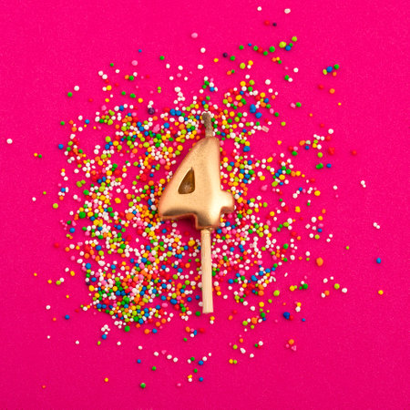 Candle number 4 - Birthday or anniversary on rhodamine red background
