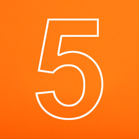 number 5 written in white on orange foamy background