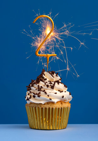 Sparks number 2 - Cake birthday in blue backgroundの写真素材