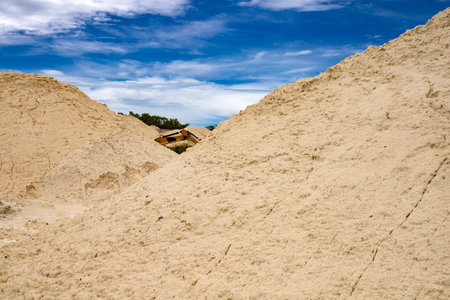 Open foundation kaolin mine - Extraction of white mud and clayの写真素材