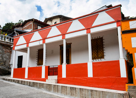 Traditional Colombian architecture, typical facade of symmetrical colors - Heliconia, Antioquiaのeditorial素材