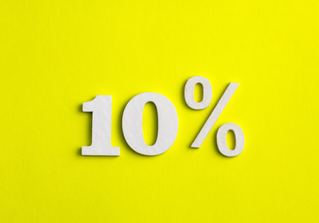 10 percent discount on yellow background - Business concept
