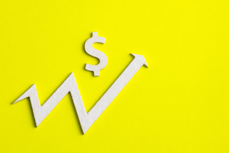 Increase in interest on value - Arrow and value icon on yellow backgroundの写真素材