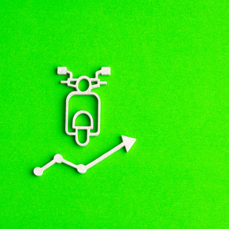Electric motorcycle with arrow on green background