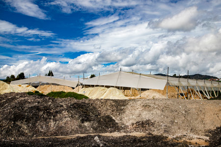 Open foundation kaolin mine - Extraction of white mud and clayの写真素材