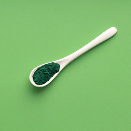 Spirulina powder healthy dietary supplement - Algae powder in spoonの写真素材
