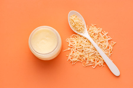 Grated Cocos nucifera in the spoon - Virgin coconut oil.の写真素材