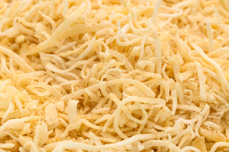 Cocos nucifera - Pile of fresh shredded coconut.