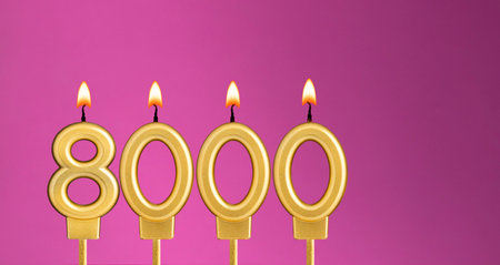 Candles form the number 8000 - Number of followers.の写真素材
