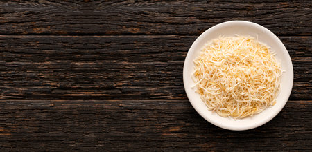 Fresh grated coconut in the bowl - Cocos nucifera.の写真素材
