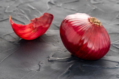Fresh red onion on the table - Allium cepa.の写真素材