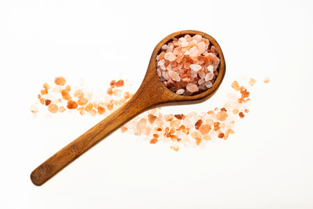 Himalayan pink fine salt - Salt in pure crystals on the spoonの写真素材