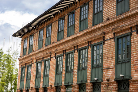 Medellin, Antioquia. Colombia â February 23, 2024. Carre Building, It was built in adobe and has four floors, which in 1895 became the tallest building in the city.の写真素材