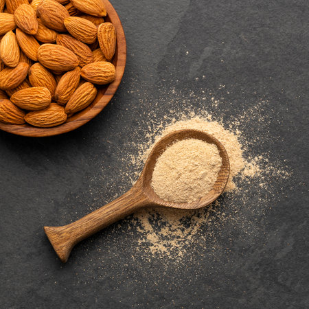 Ground dried almonds in a spoon - Prunus dulcisの写真素材