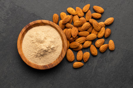 Dried and powdered almonds in the bowl - Prunus dulcisの写真素材
