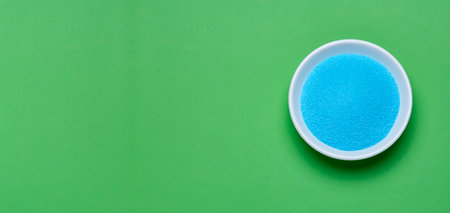 Blue sea salt in a bowl - Copper sulfateの写真素材