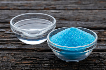 Blue sea salt in a mixing bowl with water - Copper sulfate