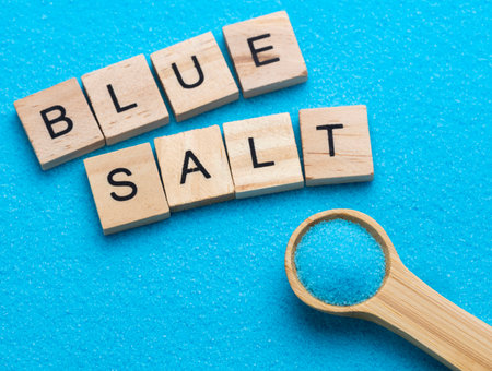 Blue fine crystal salt in a spoon - Persian blueの写真素材
