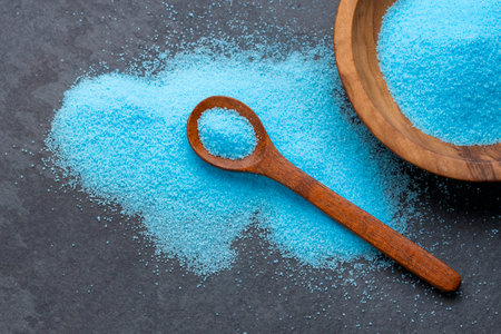 Fine and pure blue salt in a spoon and bowl - Sodium chlorideの写真素材